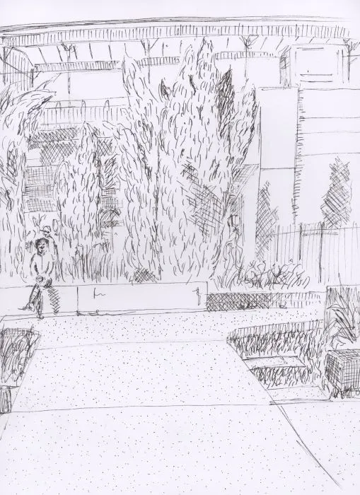 Personnage assis sous la gare Jean Macé
